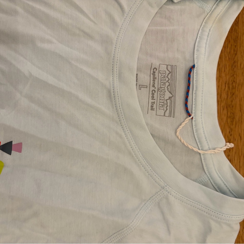 Patagonia capilene cool Sky Blue Tee with Graphic size L